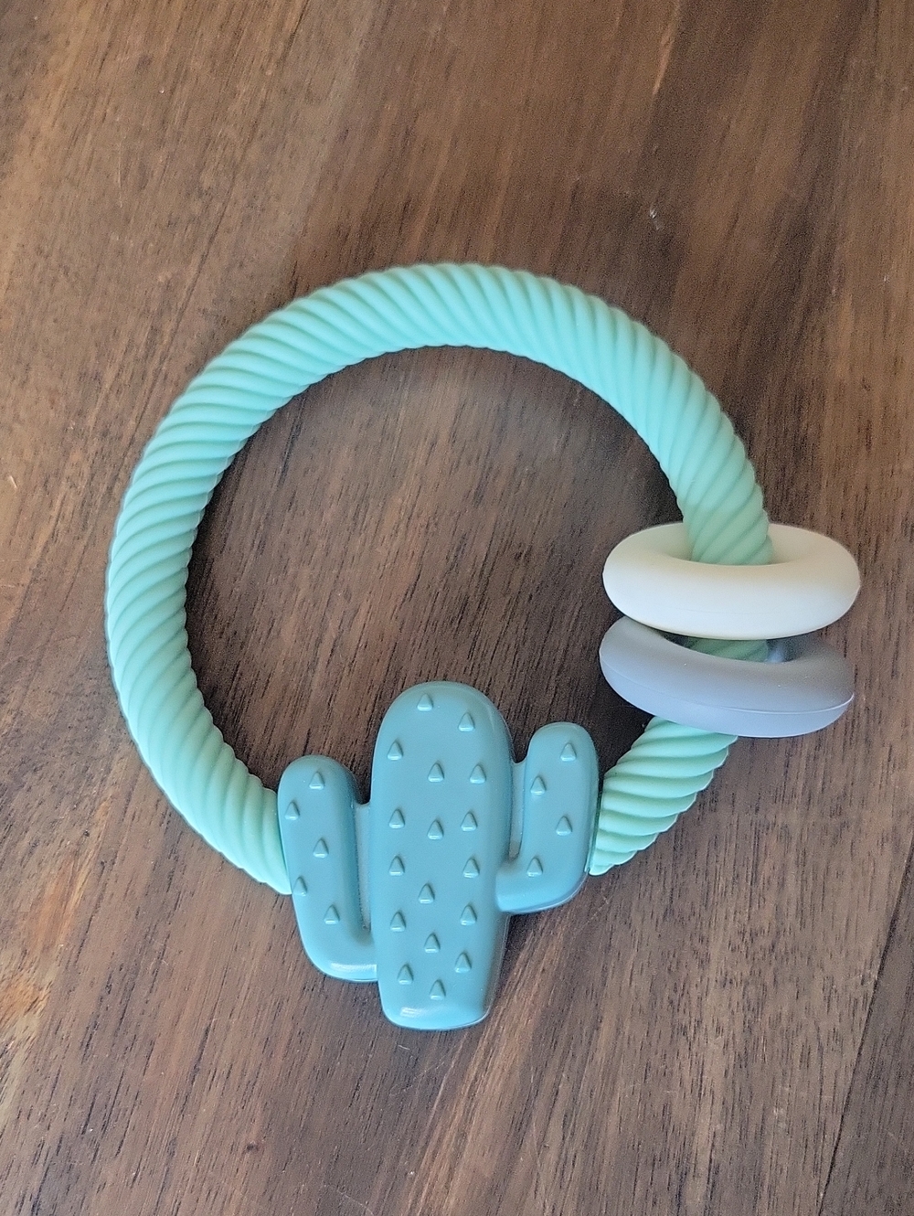 Itzy Ritzy Silicone Teether with Rattle; Rattle Teether Features Rattling Sound